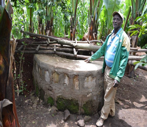 Mathewos Adeba at his new well.