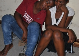 Mr. Gilead Musinga is talking with young people