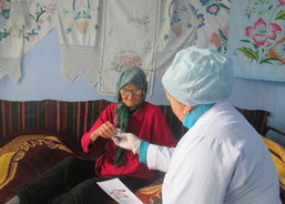 Employees of Day services centre helping with healthcare