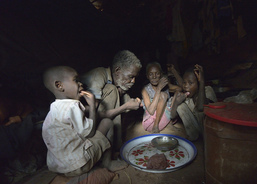 A family shares a meal