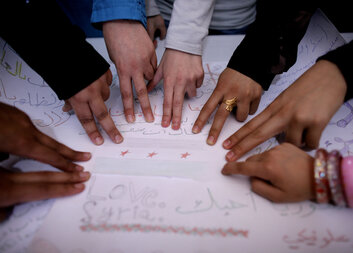 How does Caritas help refugees in the Czech Republic?