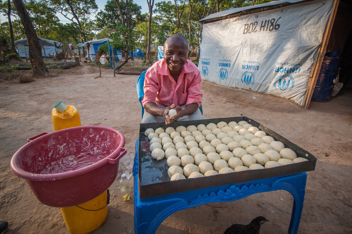 Mr Bufinda bakes bread in Zambian refugee camp